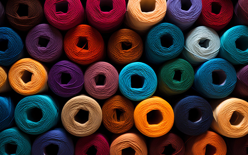 spools-of-multi-coloured-thread-sohas-fabrics